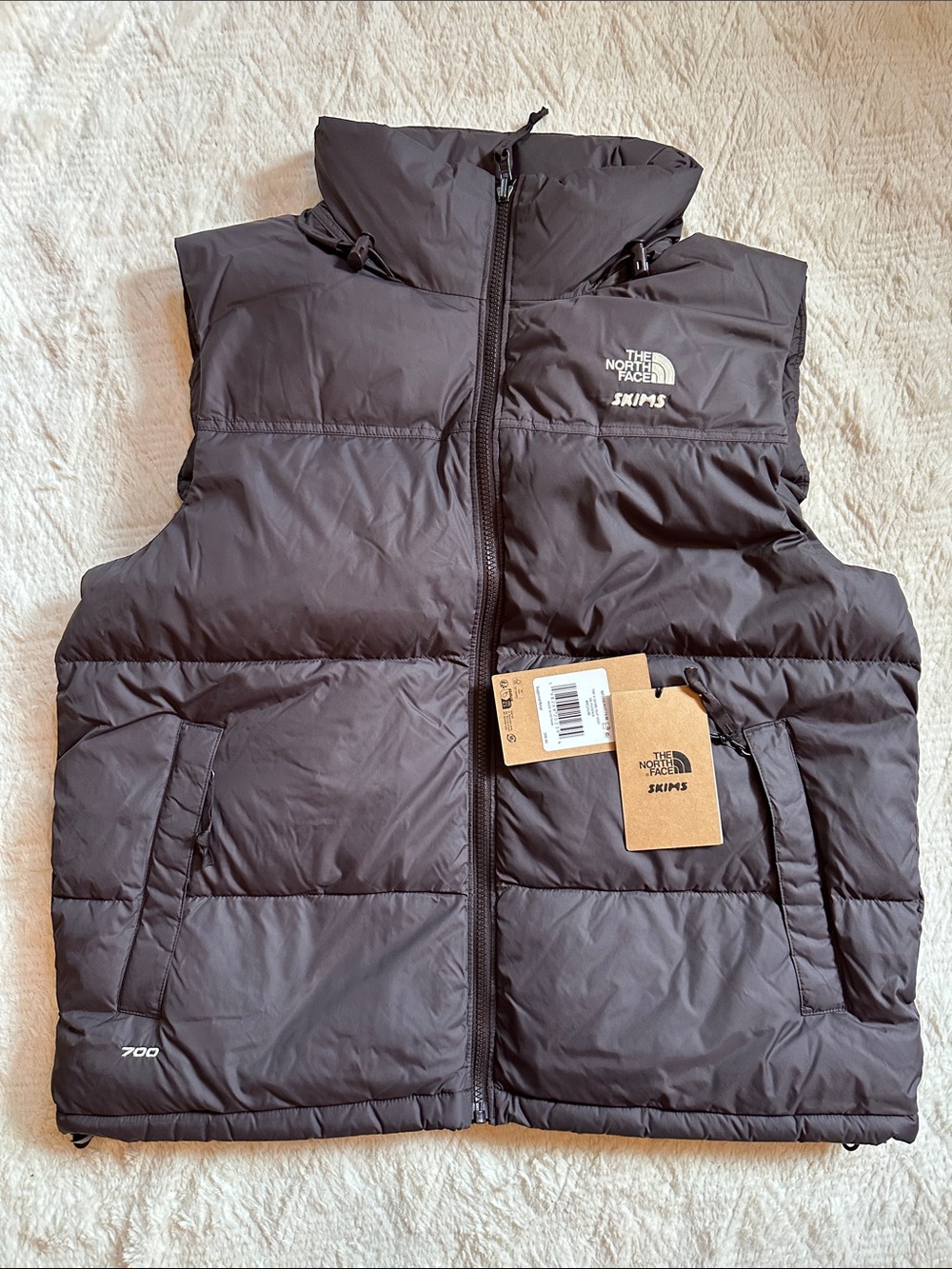 The North Face x SKIMS onyx Quilted 700 Down Vest with High Collar